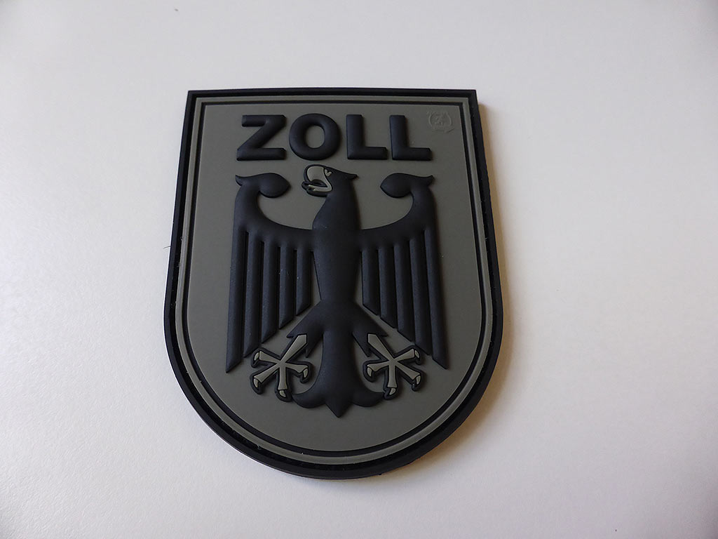 Insigne de manche ZOLL, gris pierre-olive, / Écusson en caoutchouc 3D