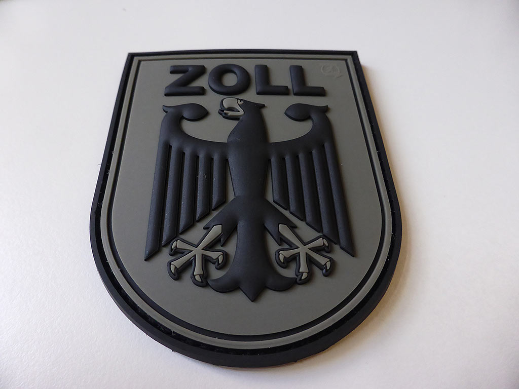 Insigne de manche ZOLL, gris pierre-olive, / Écusson en caoutchouc 3D