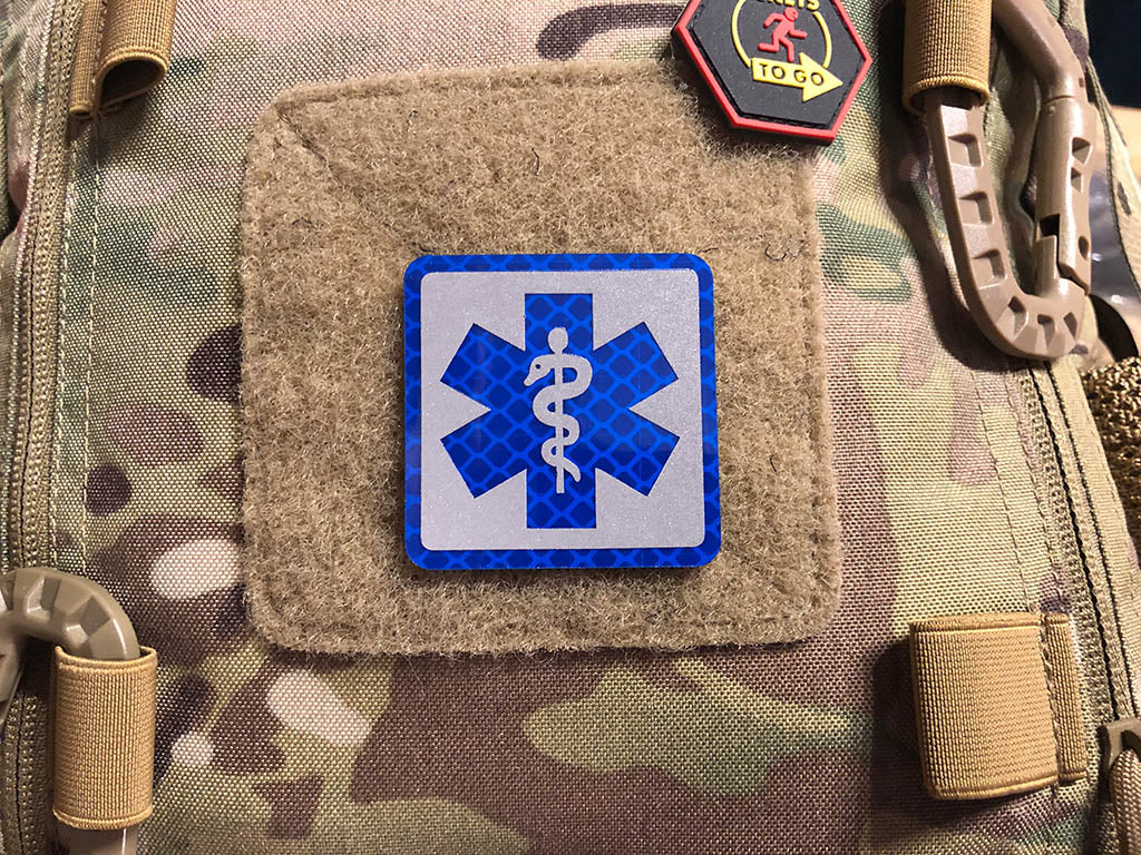 MEDIC Logo, blau und silber reflektierend, mit Klettrückseite - Patch Snatched